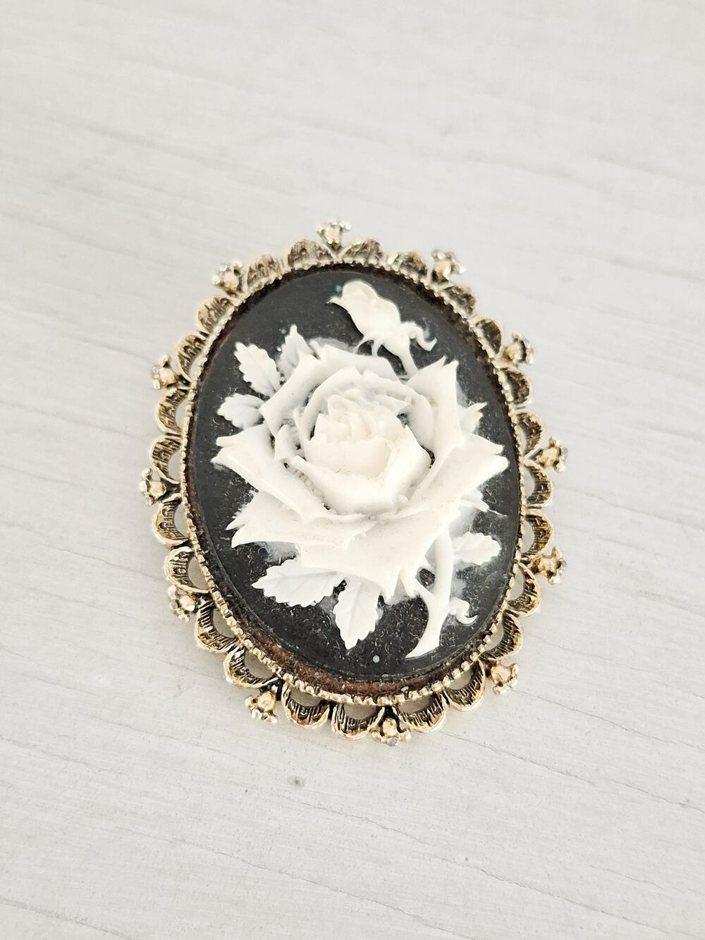Vintage Gerrys Black and White Floral Resin Cameo Brooch